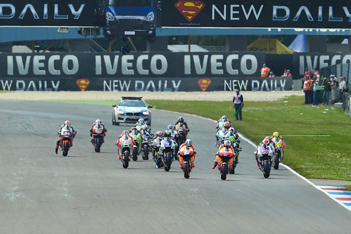 Stoner wins as Lorenzo crashes